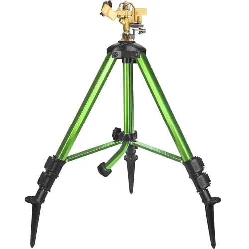 Triumpeek Impact Sprinkler on tripod with stakes for stability in a garden